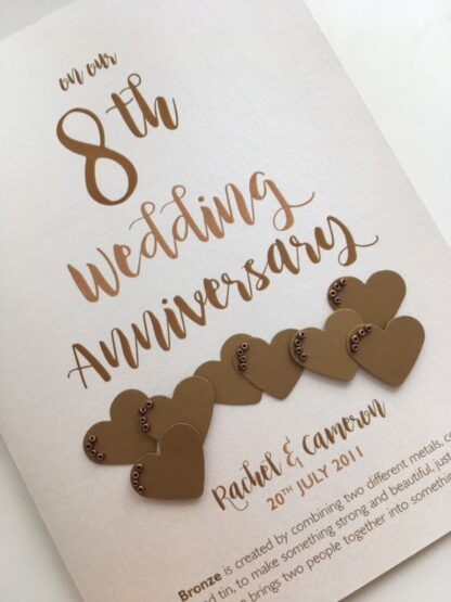 with bronze effect card hearts