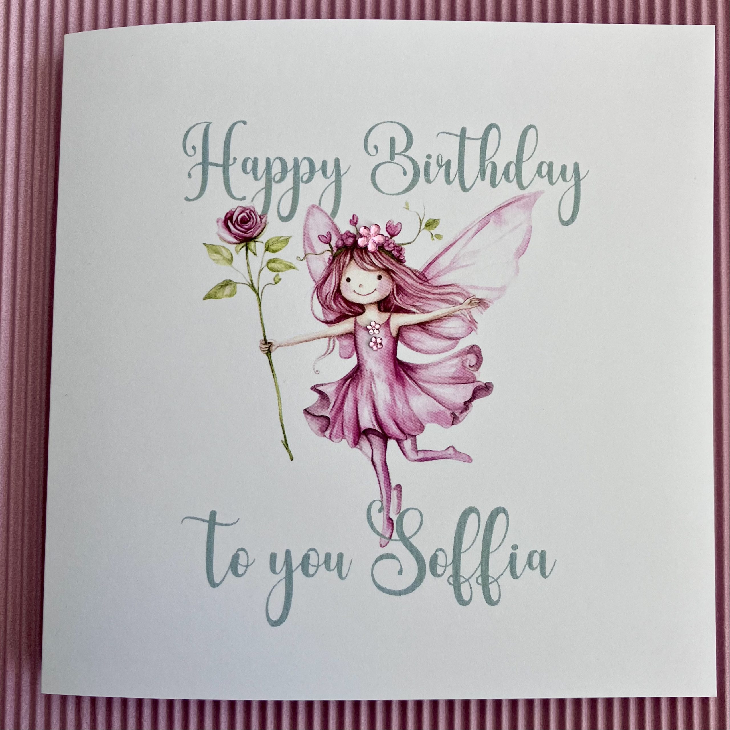 A pretty pink fairy birthday card, personalised with name and embellished with diamanté gems