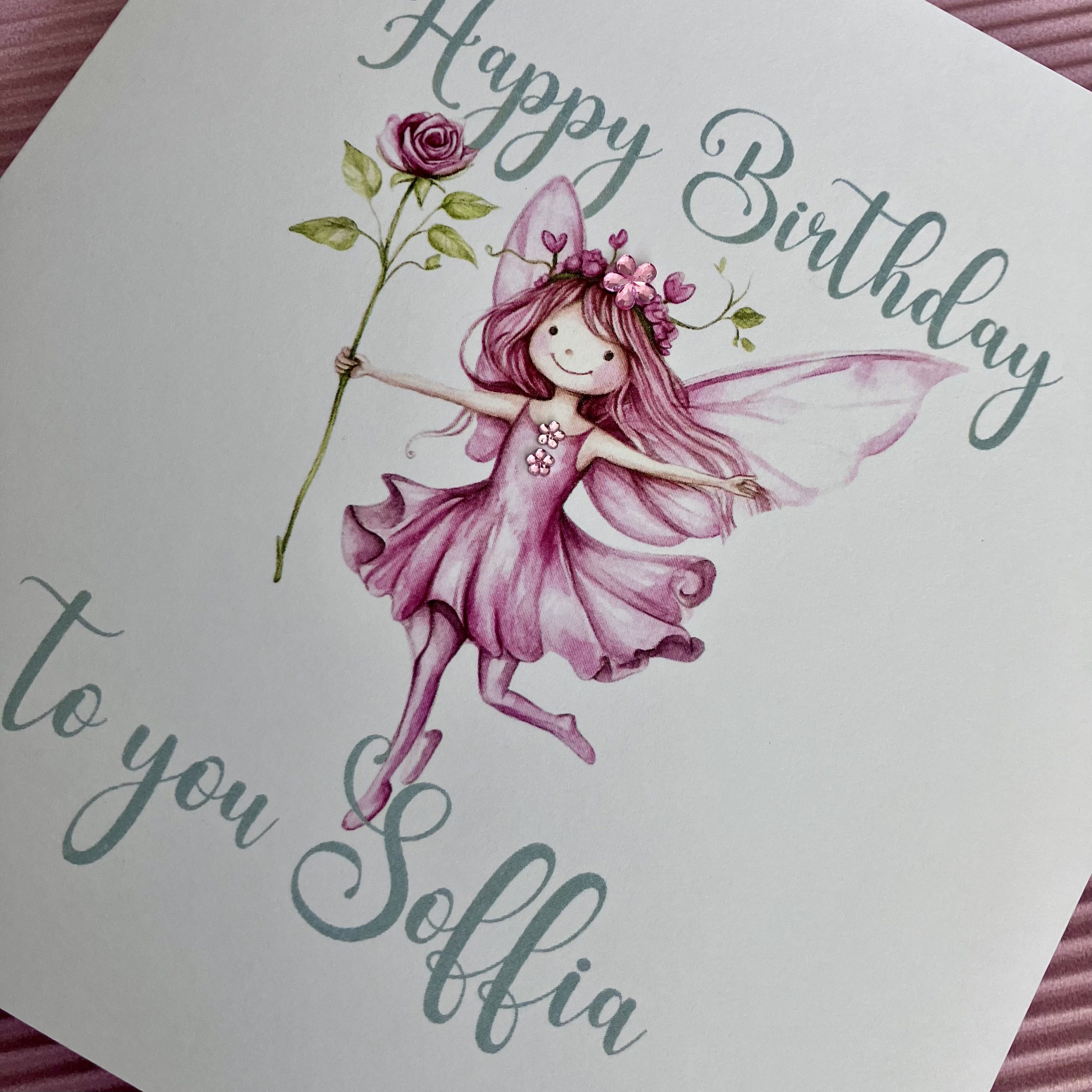 A pretty pink fairy birthday card, personalised with name and embellished with diamanté gems